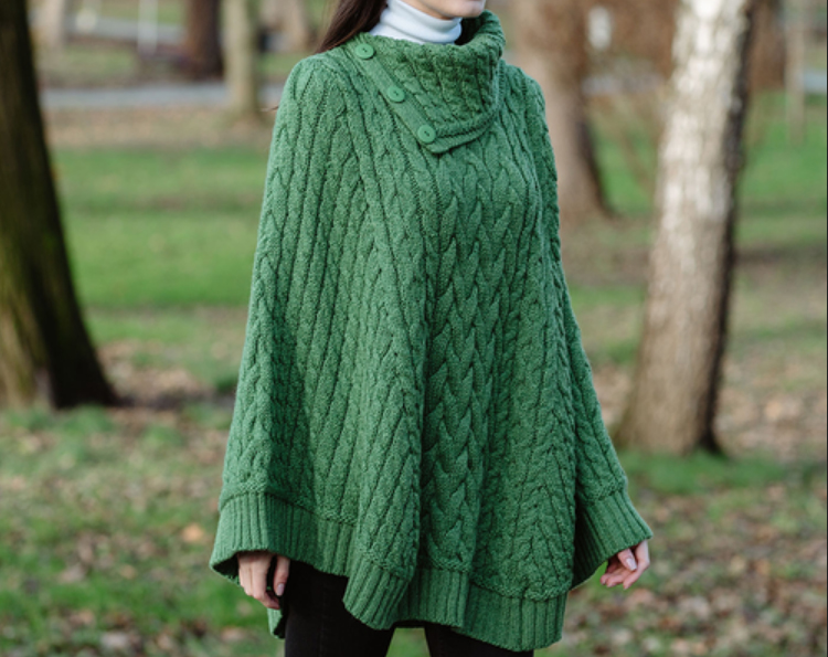 woman in a cozy knitted poncho